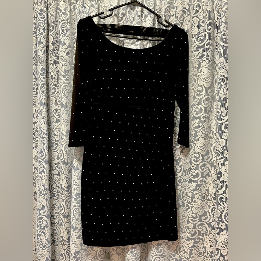 Express cute dress with sparkly studs all over.